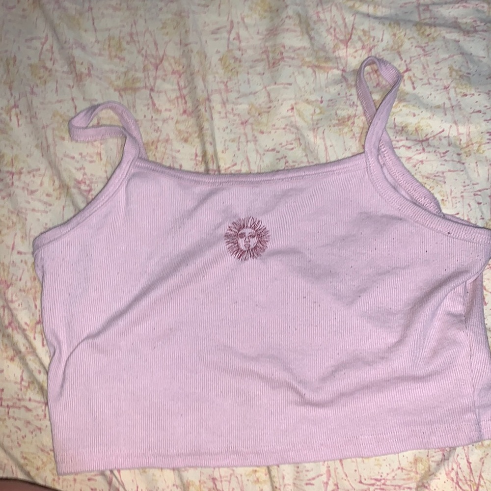 pink crop top with sun design
